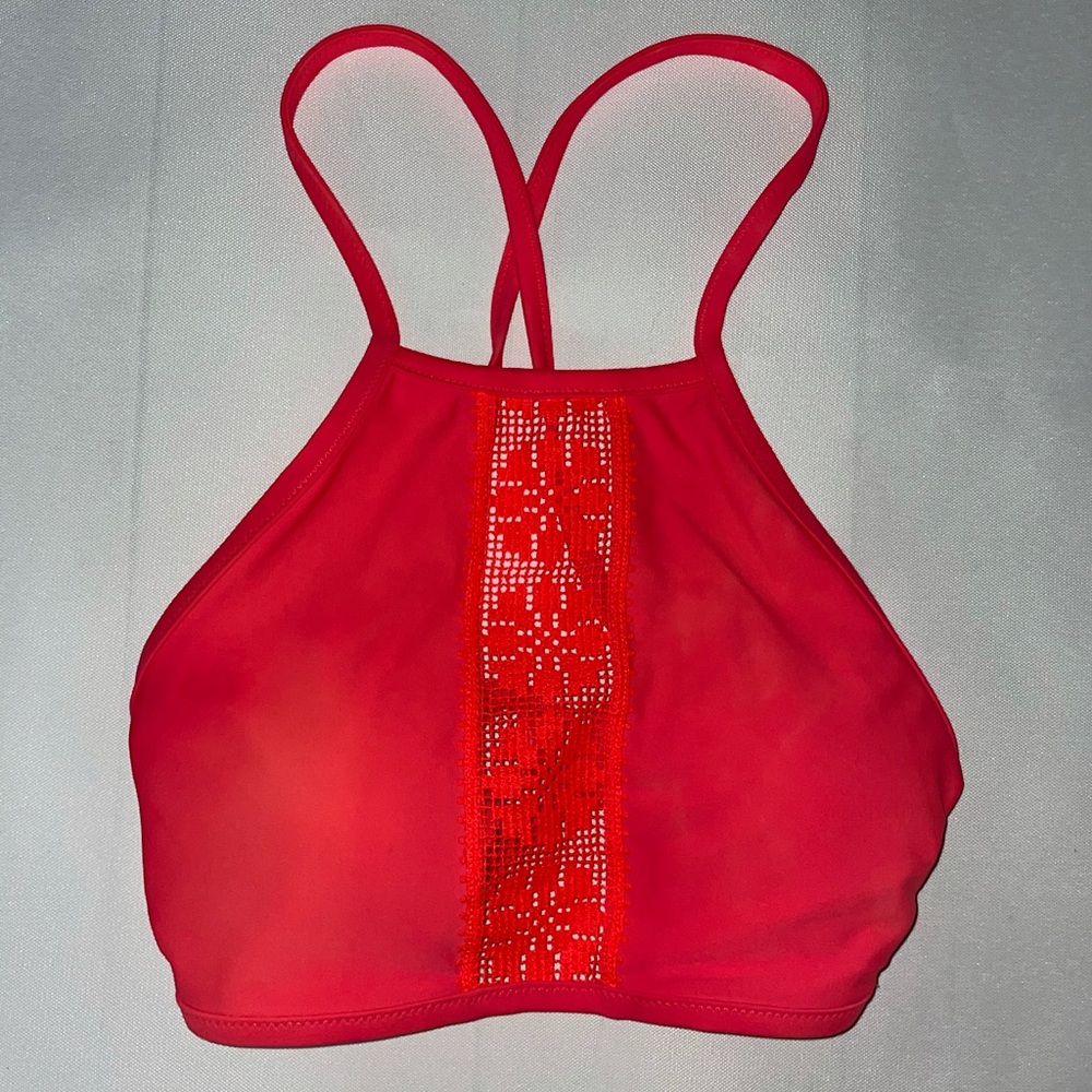 Coral bikini top with woven details and cross back
